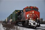 Intermodal cruises south past the yard